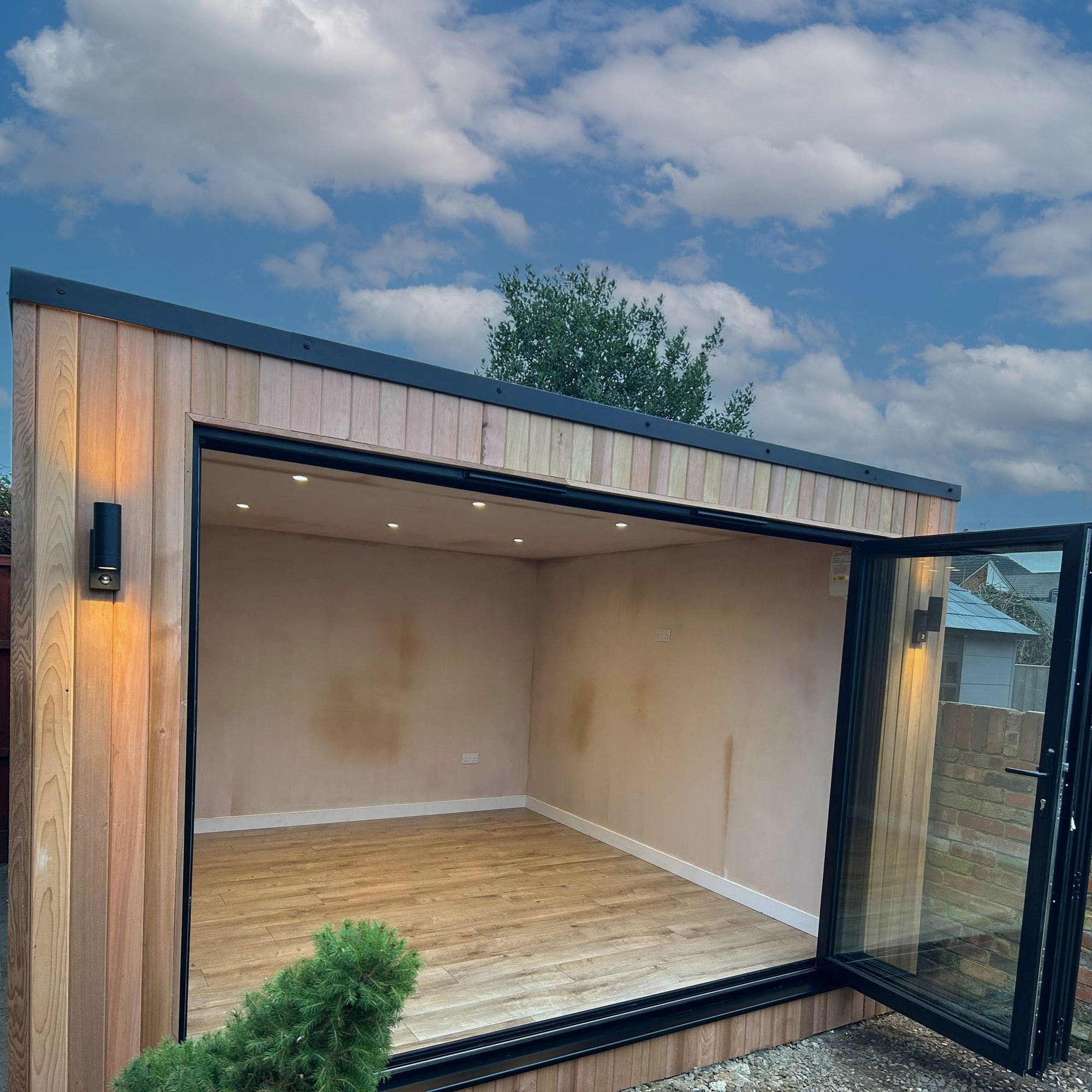 Garden pod with bifold doors and cedar