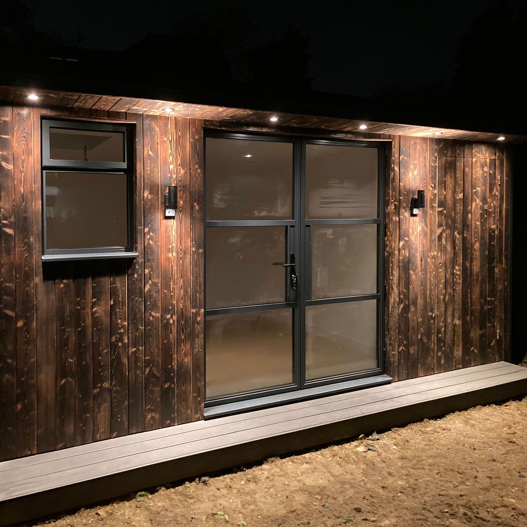 Charred Spruce Garden Room — Night