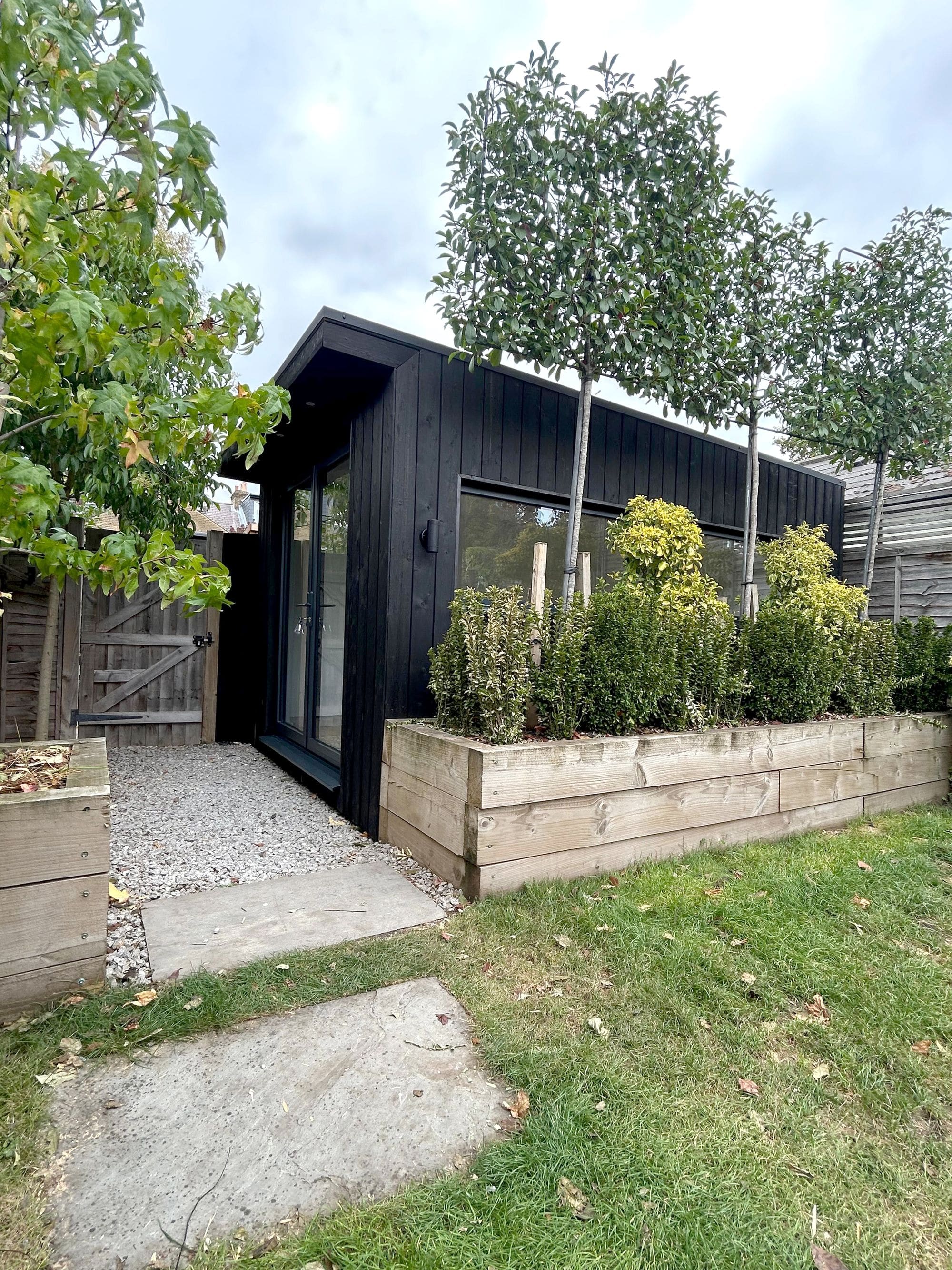 Garden room with charred spruce cladding