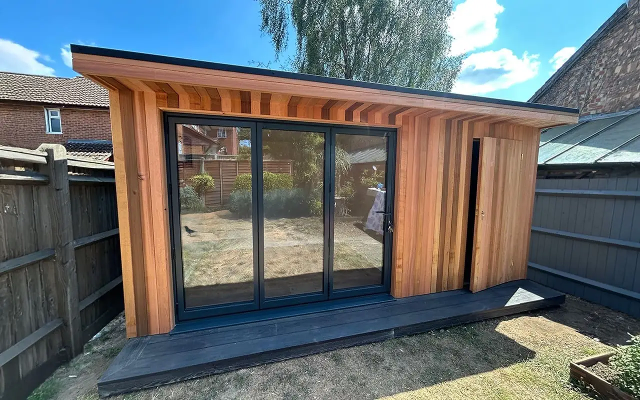 Garden room with storage and cedar cladding