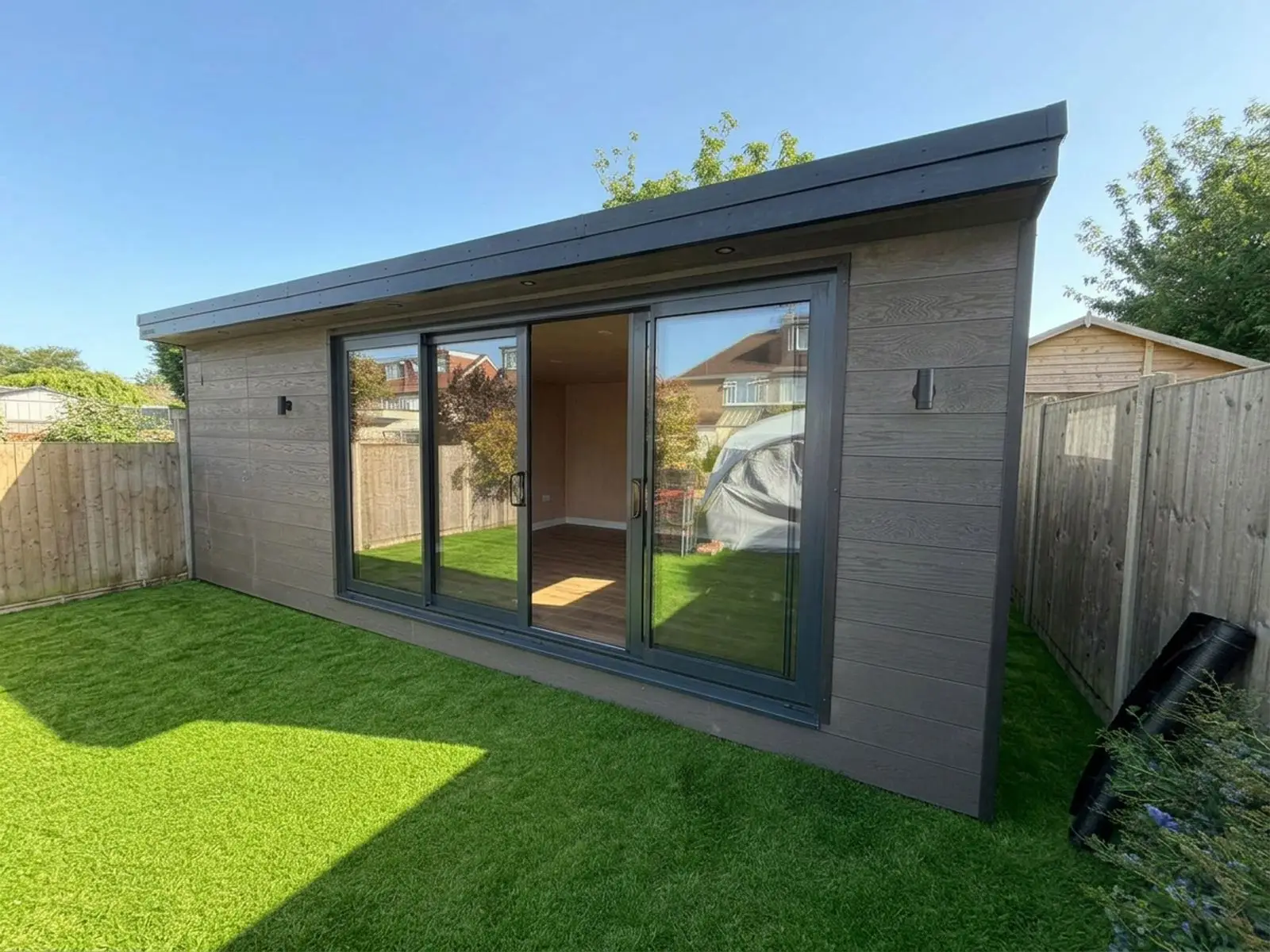 Garden room with storage, millboard cladding, 4m sliding doors