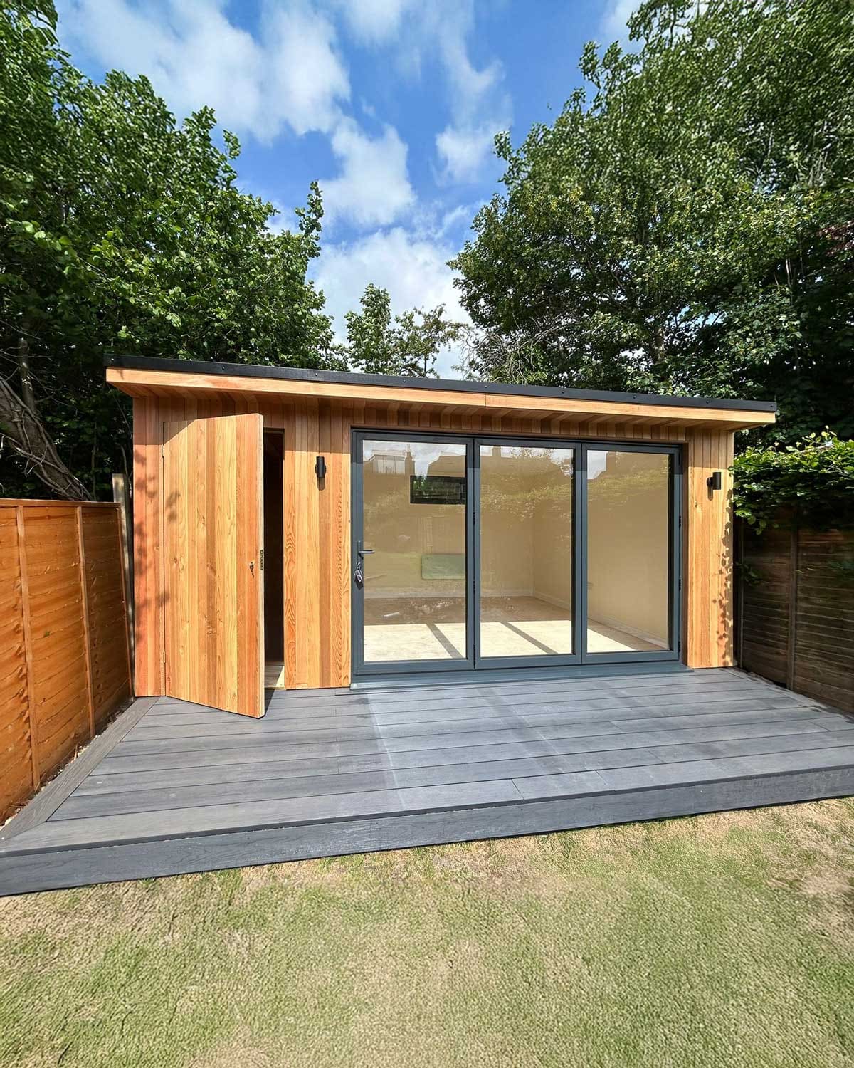 Garden room with storage and decking