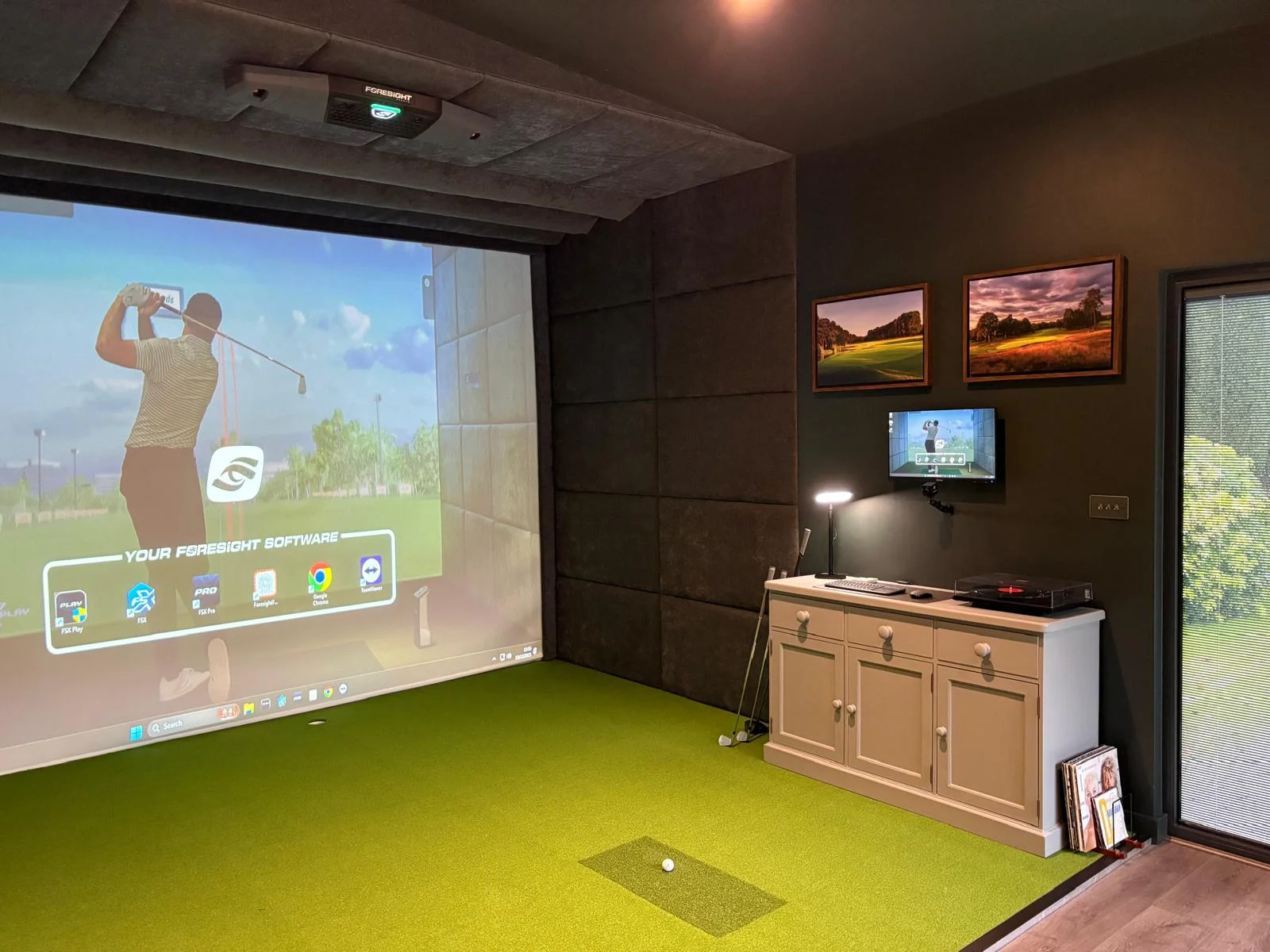 Golf simulator interior — screen and projector setup