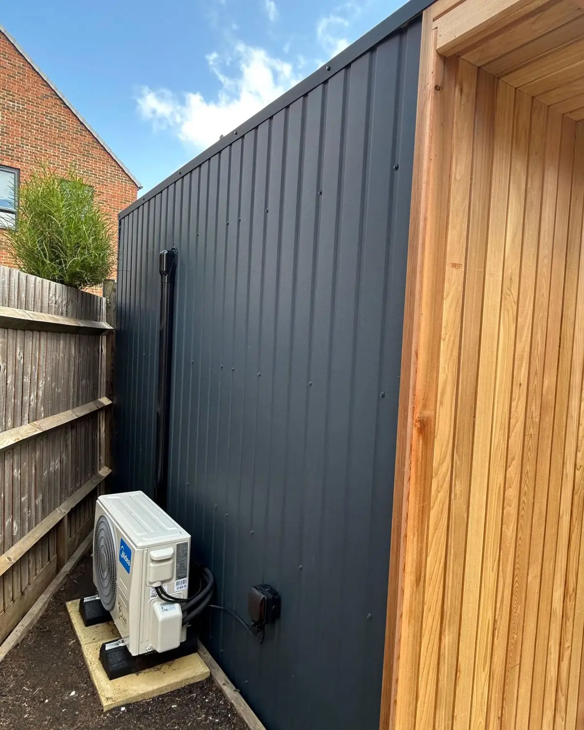 External air conditioning unit on a garden room